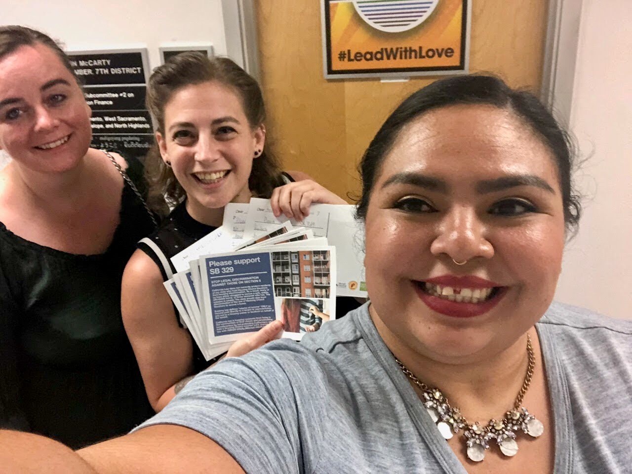 Alexandra and Rebekah from Mutual Housing California with Toru from Housing California delivering postcards to Sacramento representatives on August 27, 2019